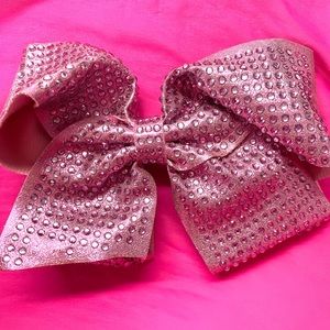 Claire’s pink sparkly hair bow